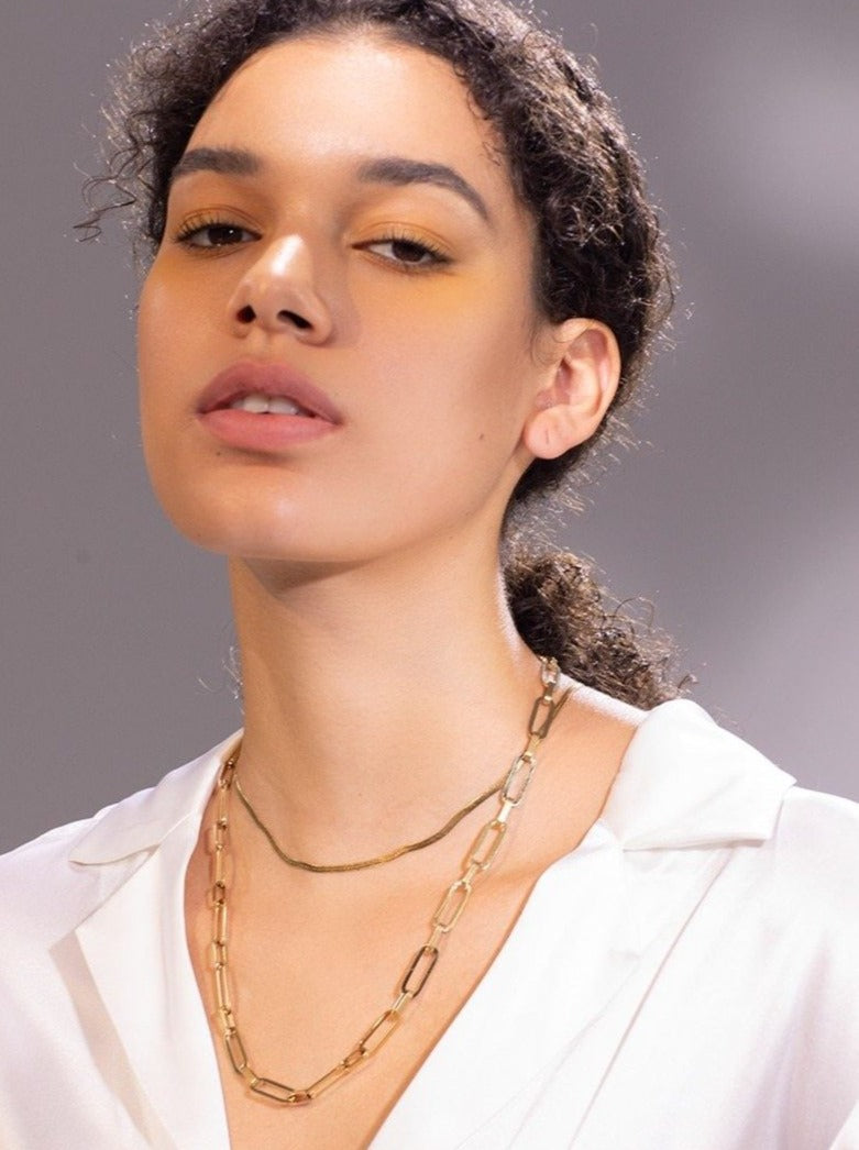 latina girl with chunky chain and snake chain